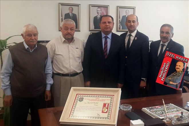 Afyonlu Gazilerden Öztürk´e hizmet madalyası
