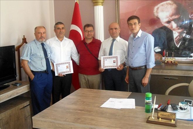 Çalışkan muhtara teşekkür belgesi