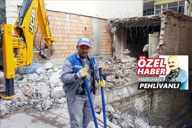 ?Ve o metruk yapı artık yok!