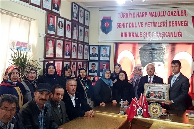 Kolat, şehit aileleri ve gazileri ziyaret etti