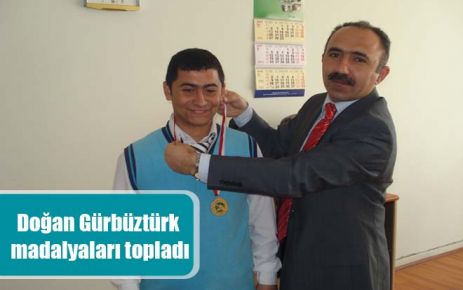 Doğan Gürbüztürk madalyaları topladı