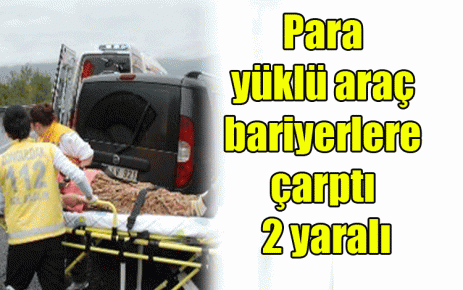 Para yüklü araç bariyerlere çarptı 2 yaralı